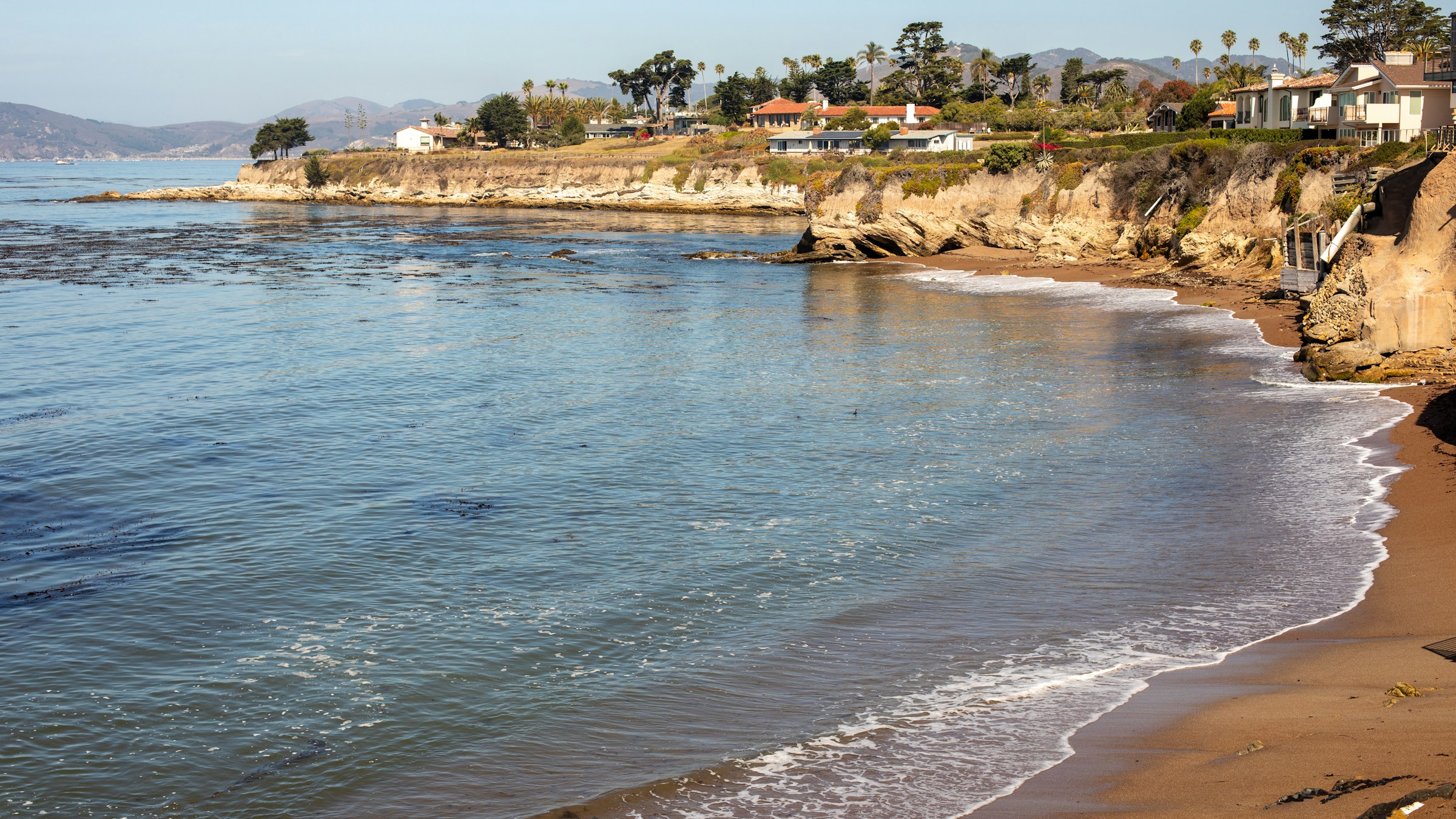 Coastal vacation homes overlooking the calm Pacific at Dillon Beach